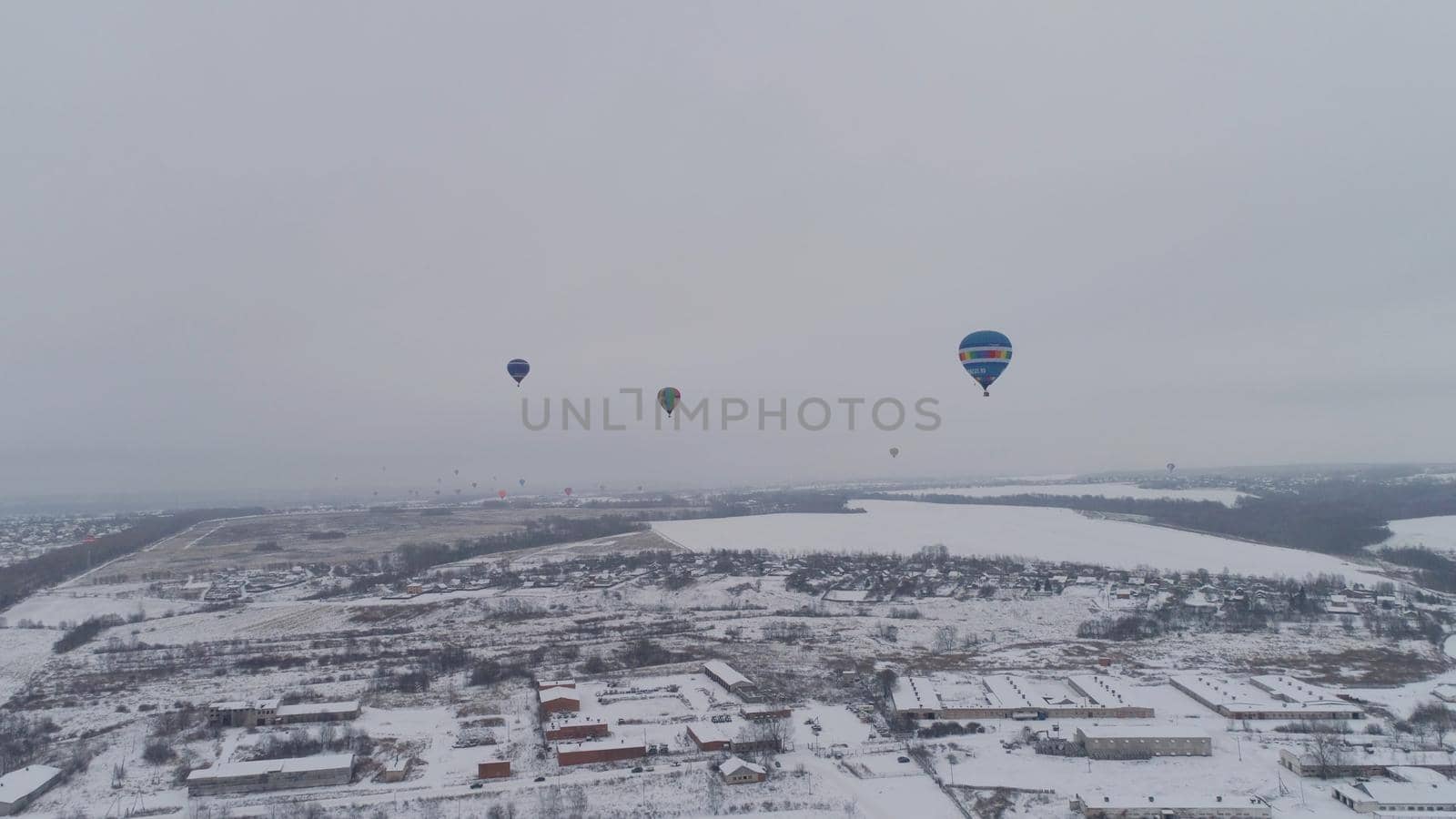 Hot air balloons in the winter season. Aerostat, Airship. Red balloon.