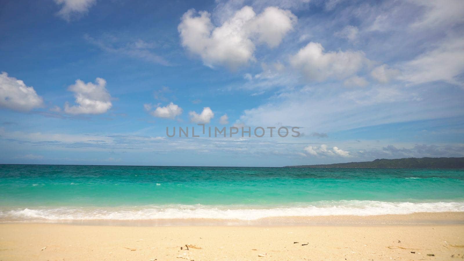 Beach, sea, sand,wave. Tropical beach, blue sky, clouds. Seascape ocean and beautiful beach paradise. Philippines Boracay Travel concept