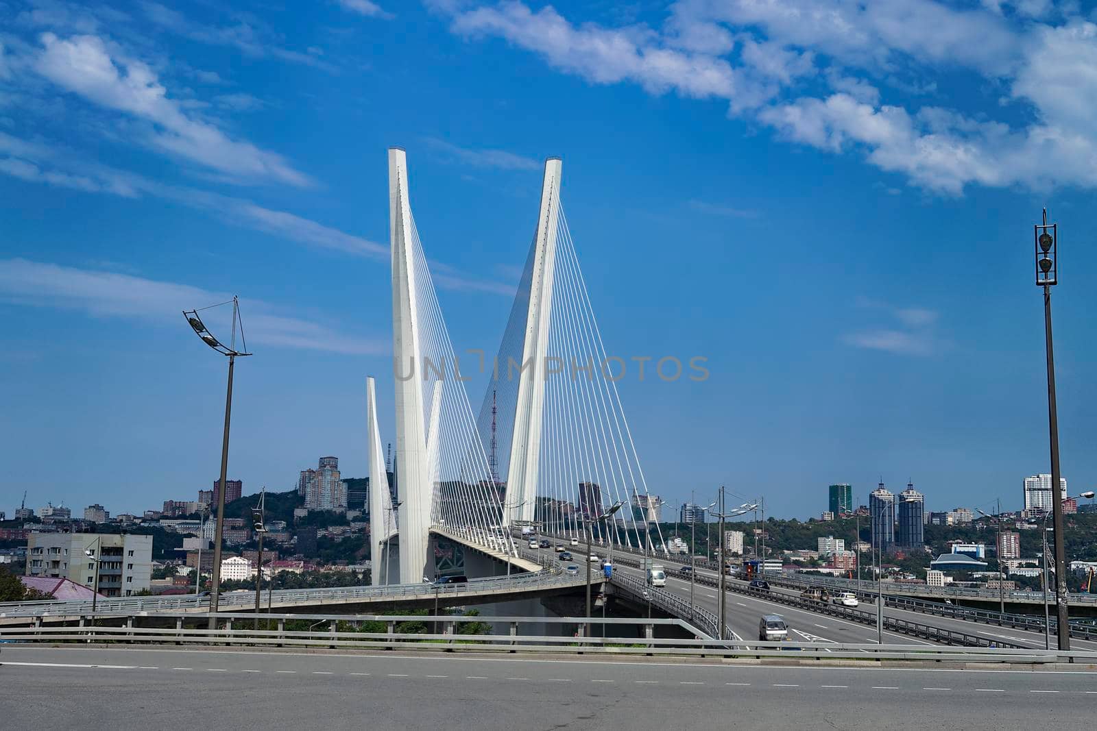 Vladivostok, Primorsky Krai. Cityscape with views of the Golden bridge and the road.