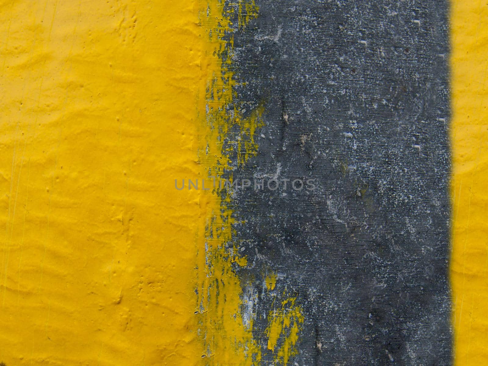 The old wall is not fully painted yellow close-up. Texture or background