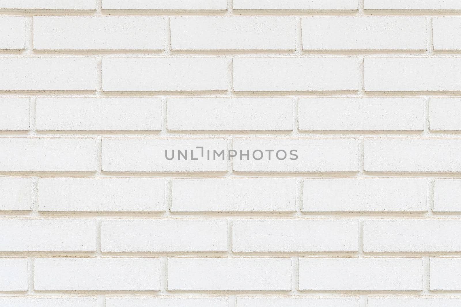 Decorative wall imitation of a white brick wall close up.Texture or background