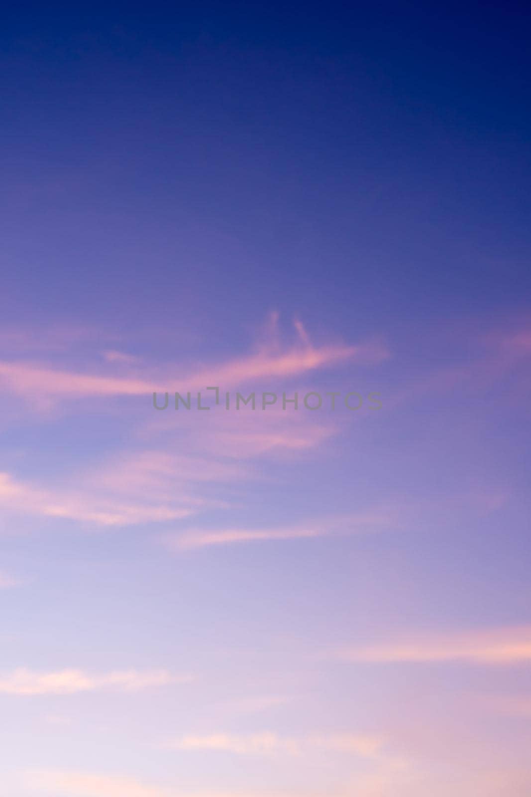 Fluffy clouds in the blue sky with morning light from the sunrise by Satakorn