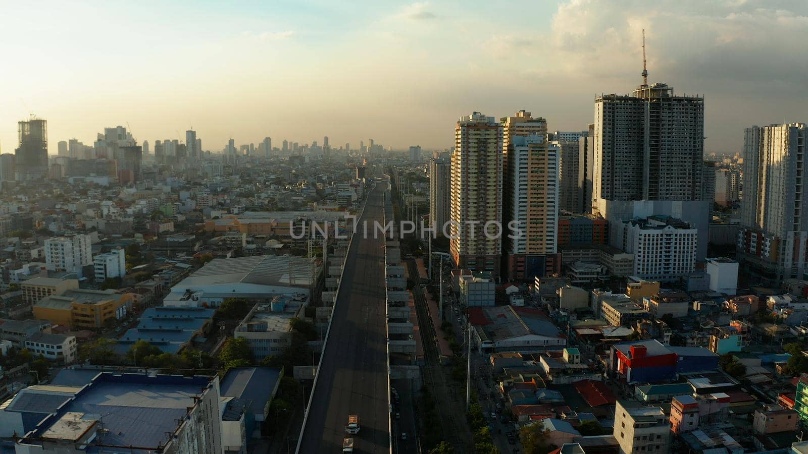 Manila city with skyscrapers, modern buildings and Makati business center, aerial drone. Travel vacation concept.