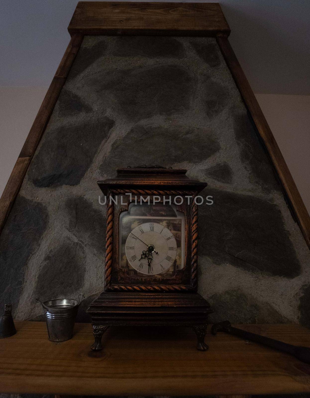 Antique wooden clock on a slate stone background by xavier_photo