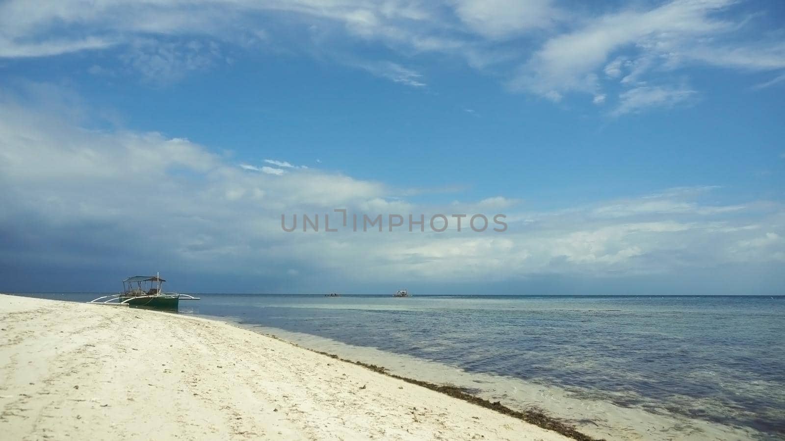 Beach, sea, sand,wave. Tropical beach, blue sky, clouds. Seascape ocean and beautiful beach paradise Philippines Travel concept
