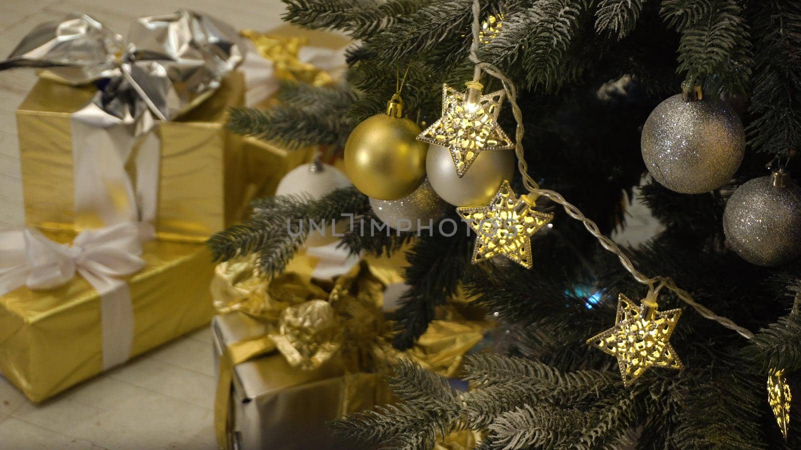 Decorated christmas tree with colorful balls. Christmas and New Year decorated interior room with New year tree.