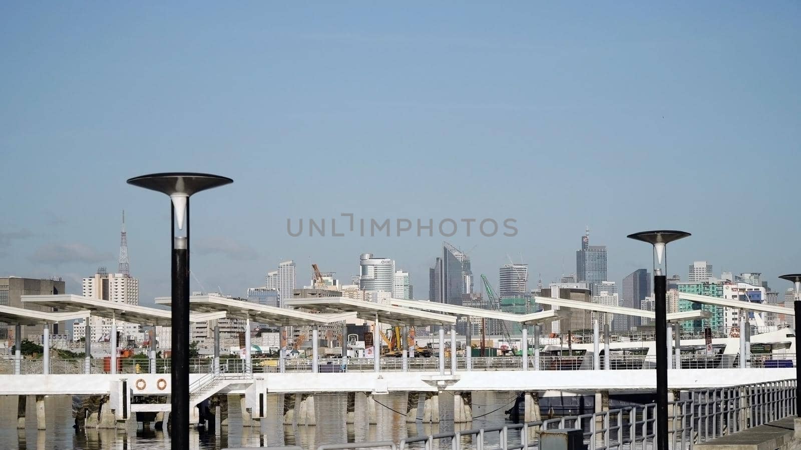 Manila city, skyscrapers and buildings. Seascape coastal city of Manila. Modern city by sea. Makati district. Travel concept.