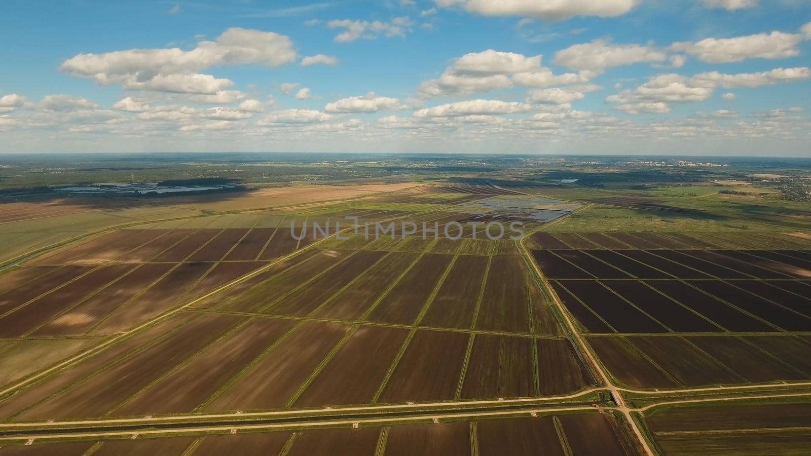 Aerial view of agricultural, cultivated fields. Agricultural landscape. Irrigated farmland