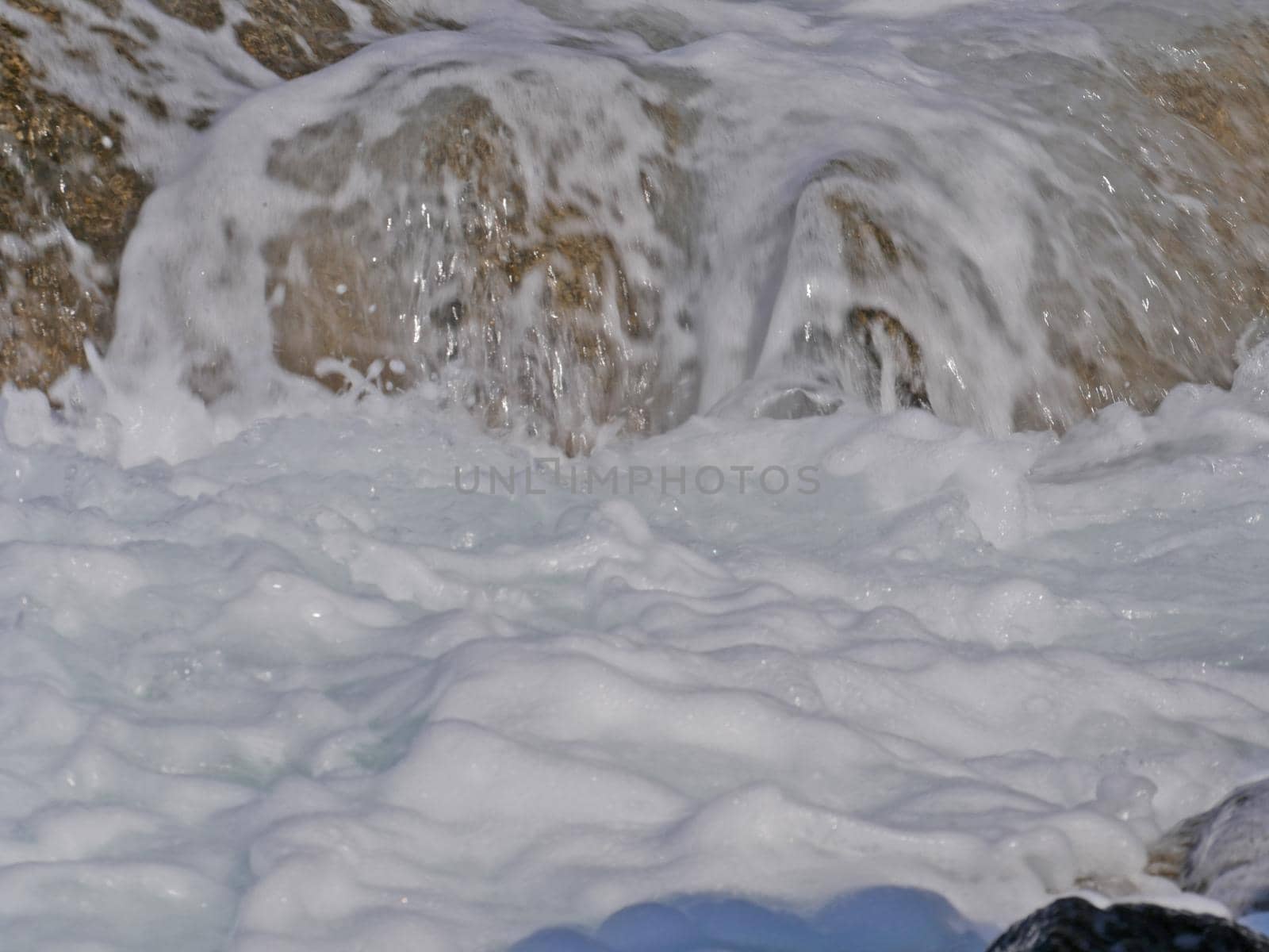 Waves crashing against the rock, natural landscape