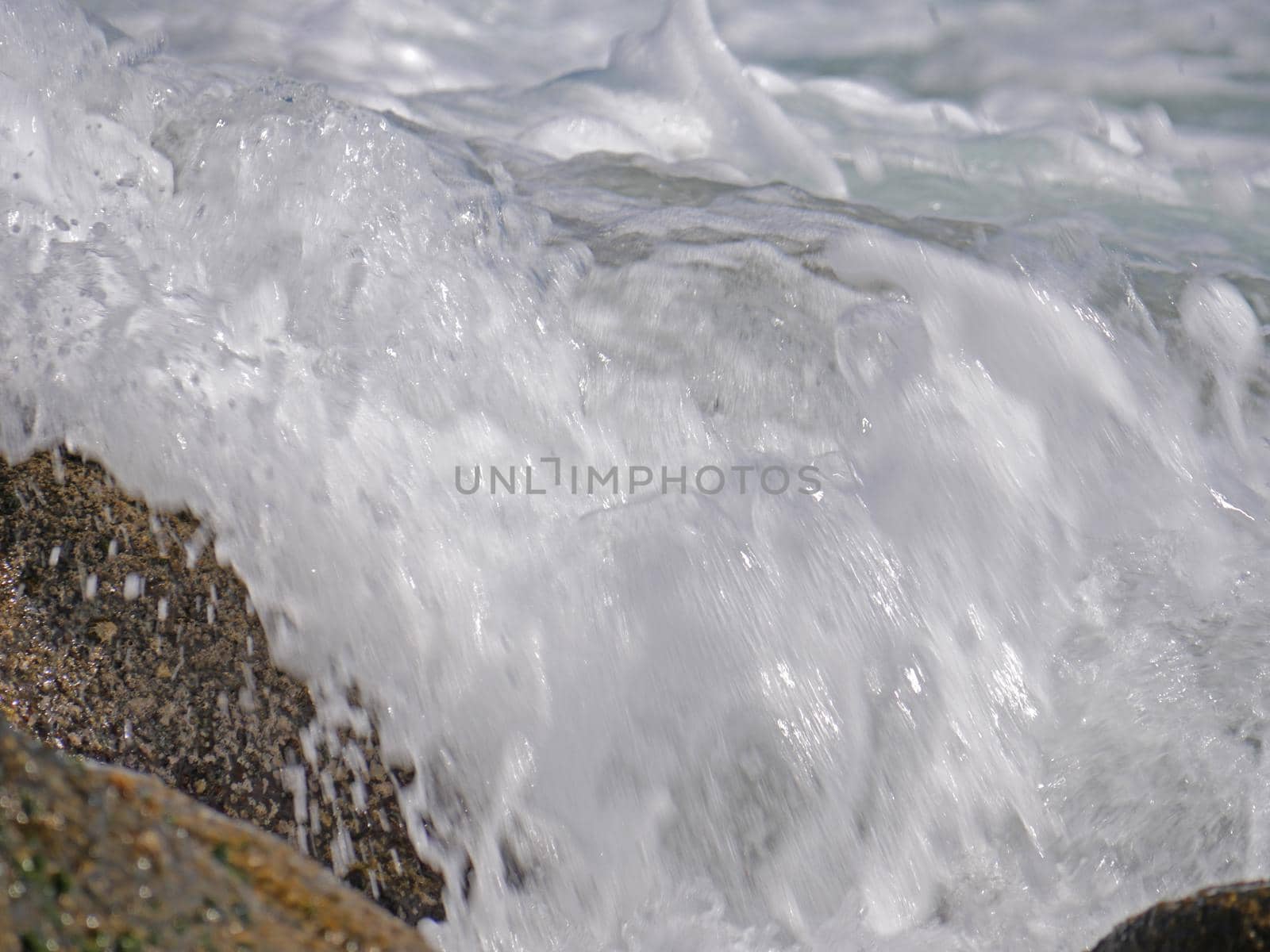 Waves crashing against the rock, natural landscape
