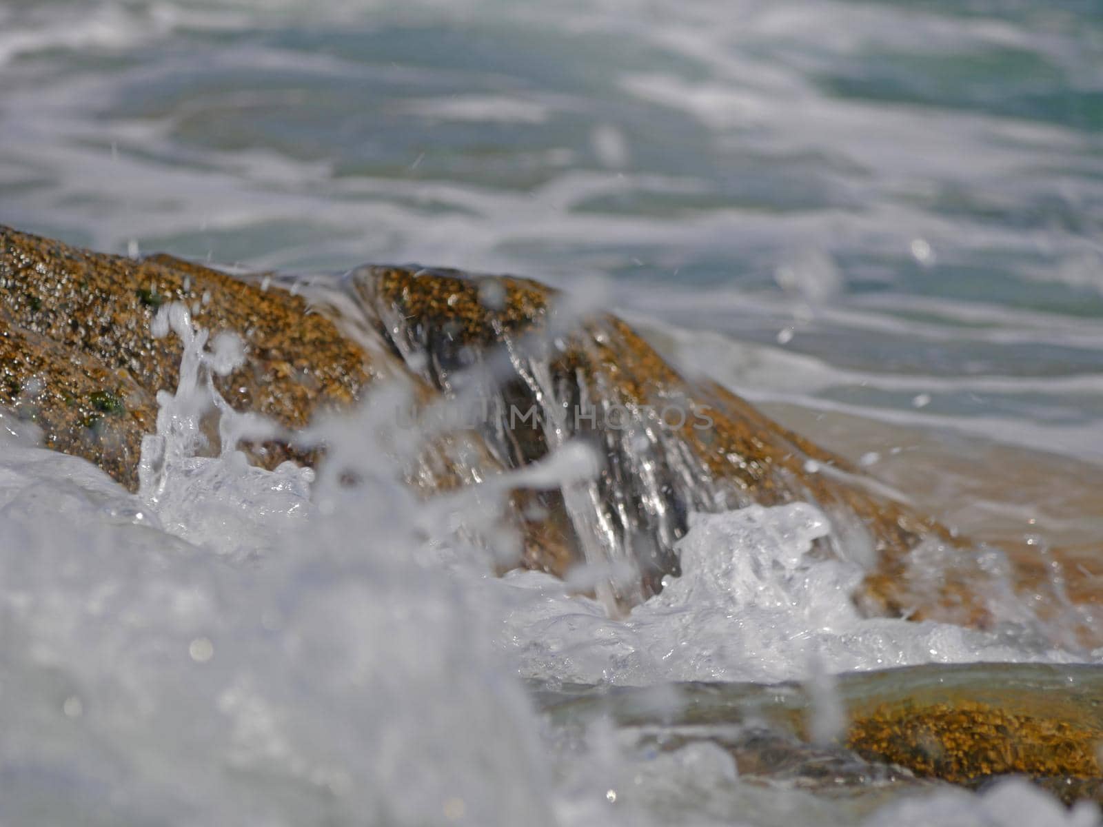 Waves crashing against the rock, natural landscape