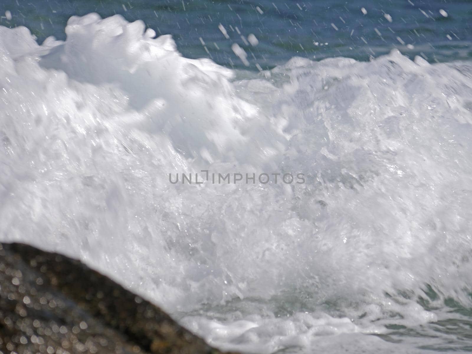 Waves crashing against the rock, natural landscape