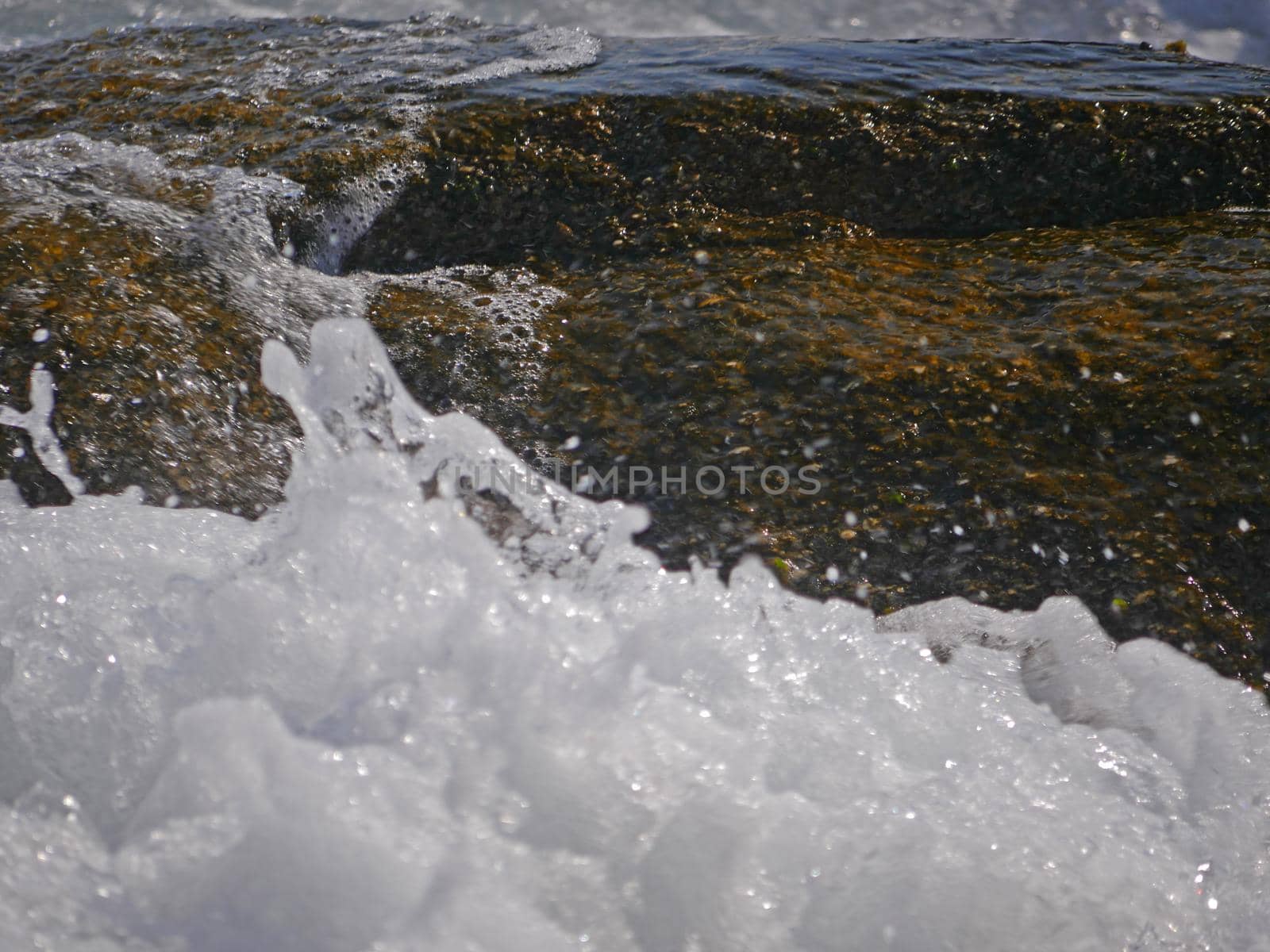 Waves crashing against the rock, natural landscape