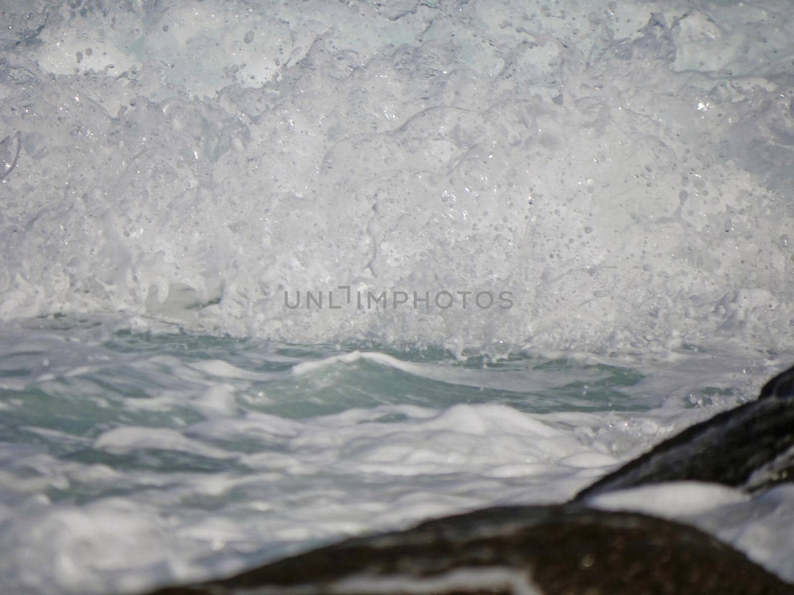 Waves crashing against the rock, natural landscape