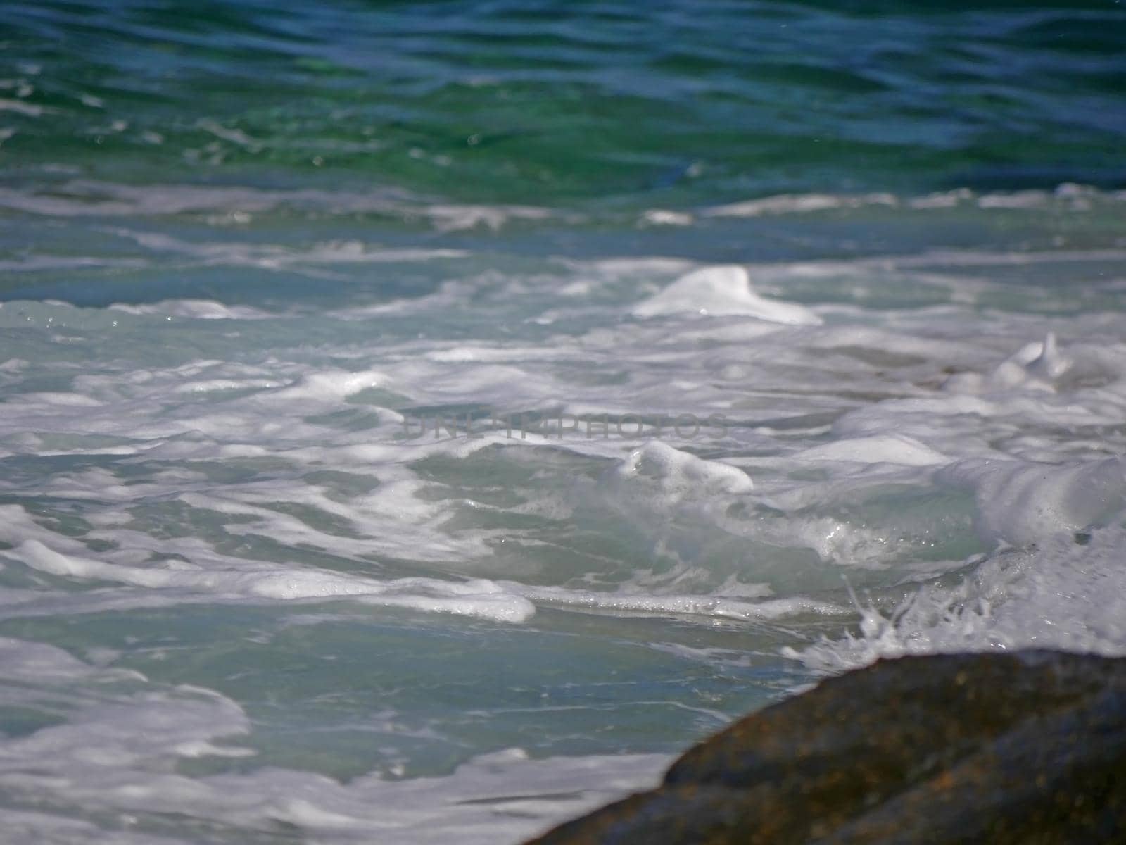 Waves crashing against the rock, natural landscape