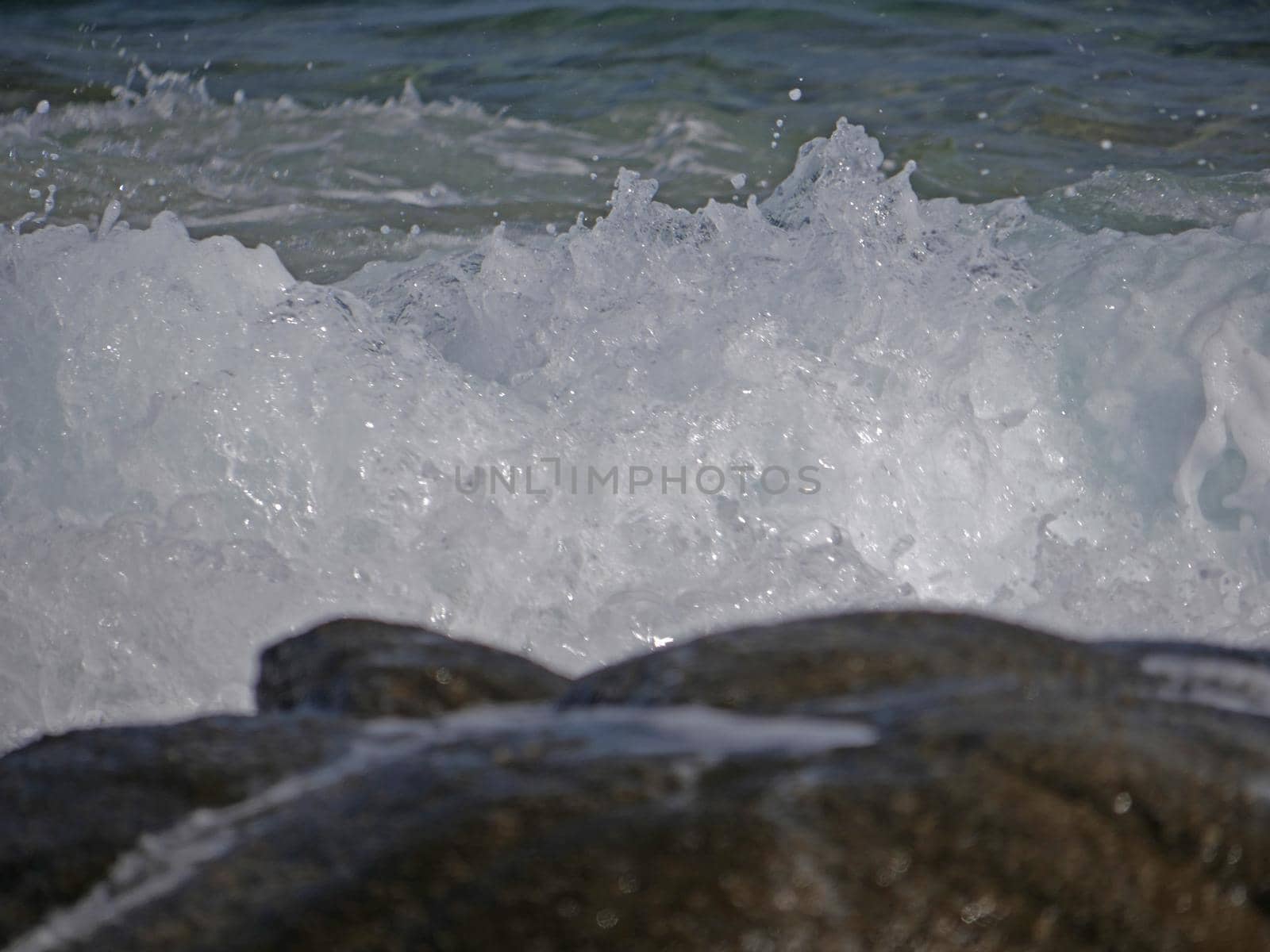 Waves crashing against the rock, natural landscape