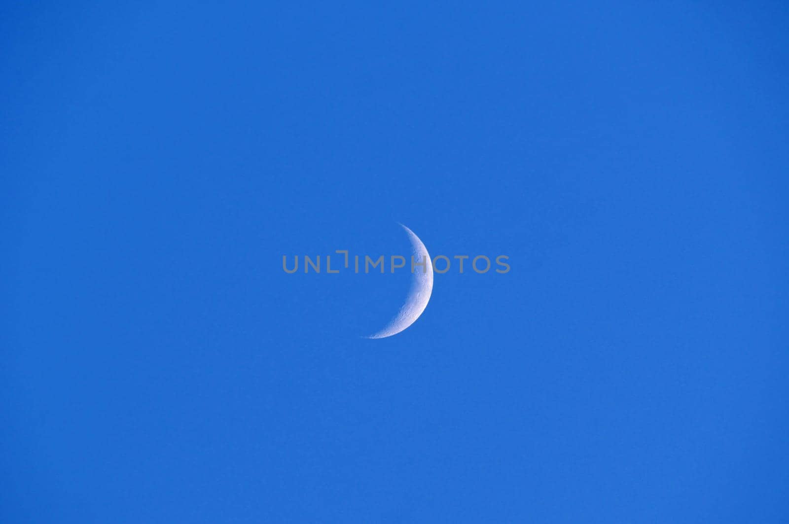 half moon at blue sky, natural background