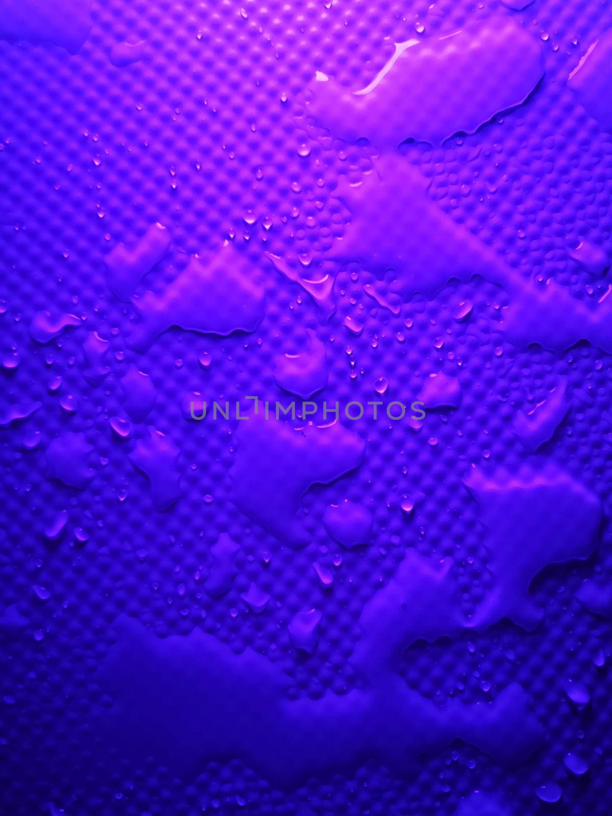 Splashes of water on shower tray highlighted in color 