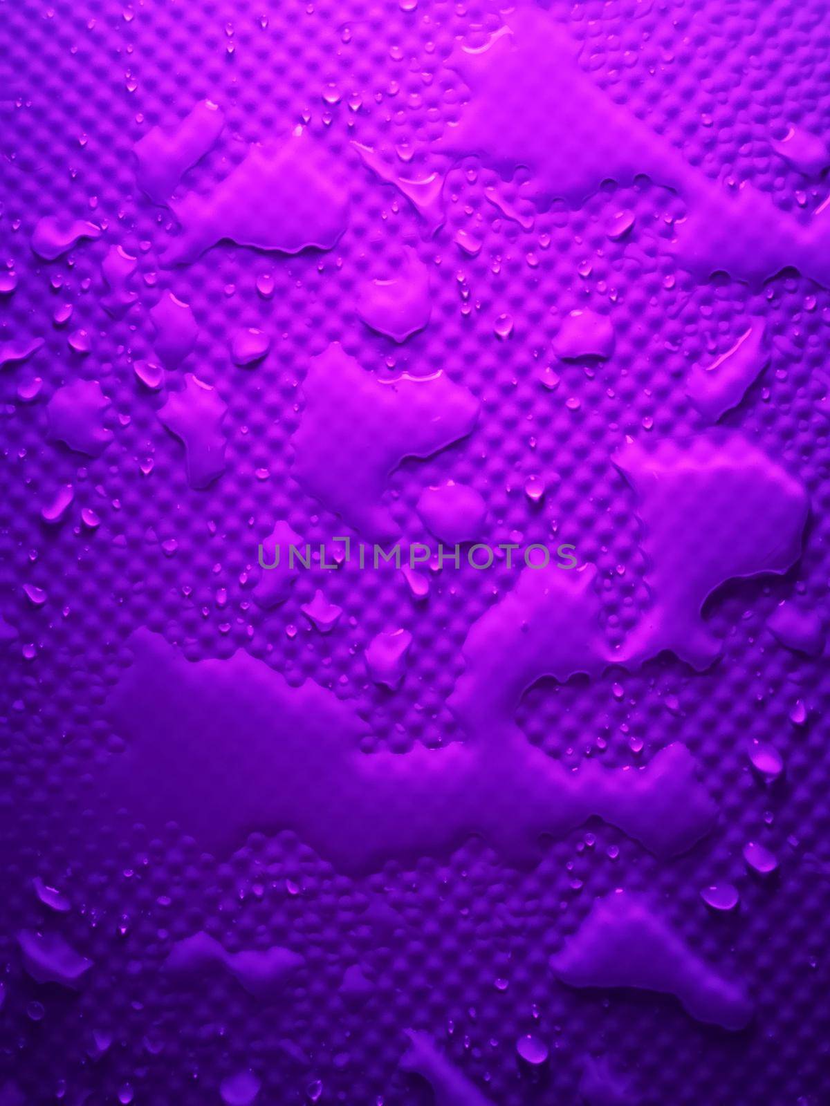 Splashes of water on shower tray highlighted in color 