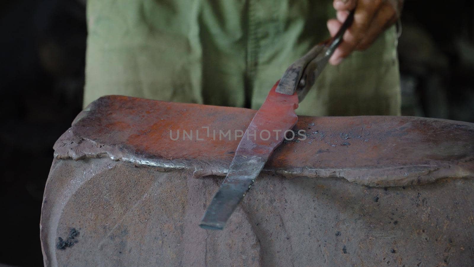 Hot metal is processed on the anvil in the forge. Anvil in the forge