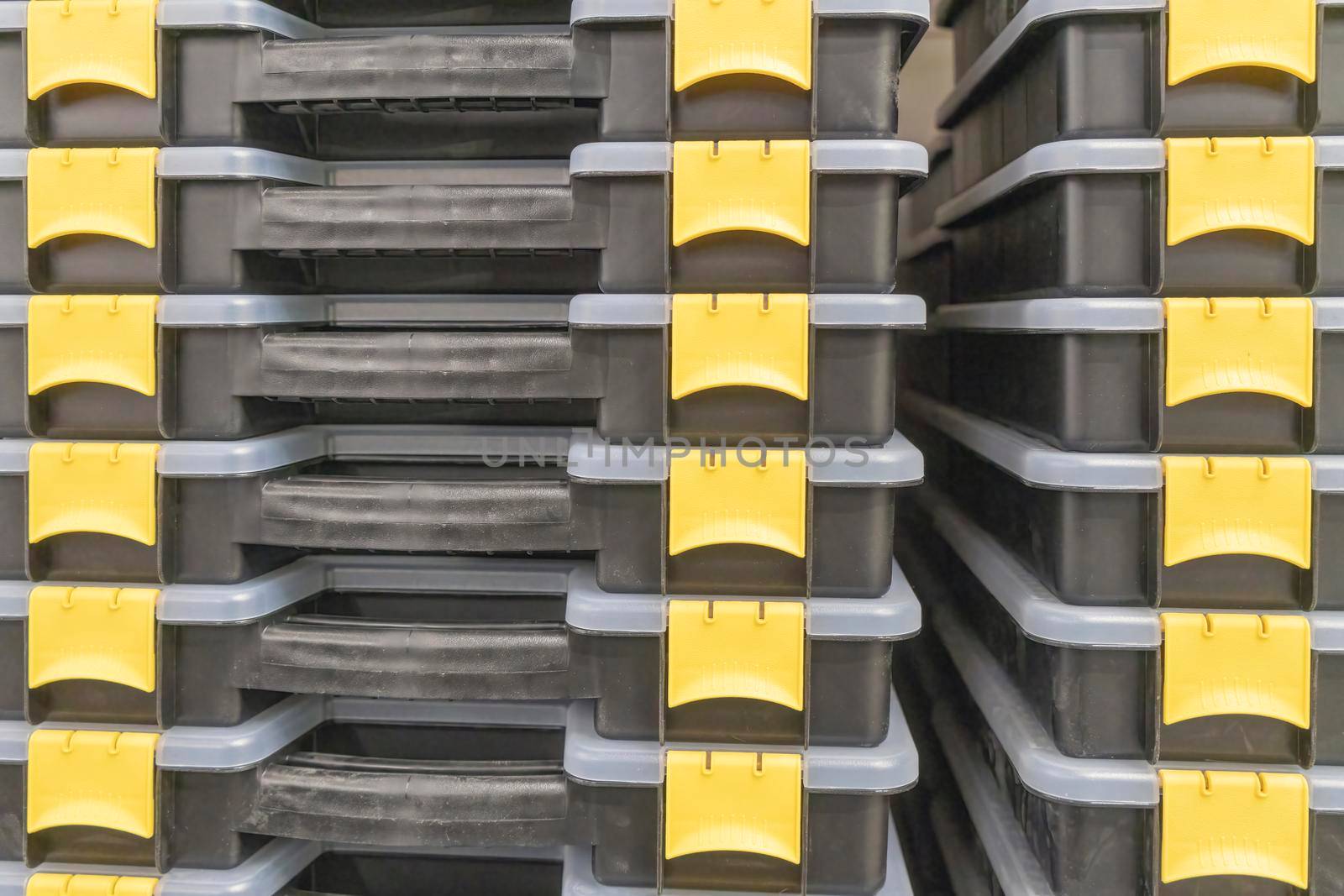 plastic tool boxes stacked like a backdrop. High quality photo