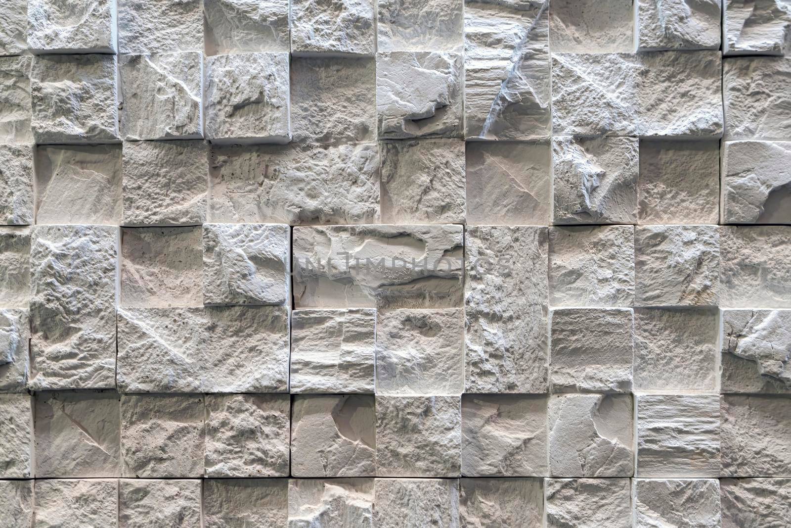 masonry wall paving stones as a background close up
