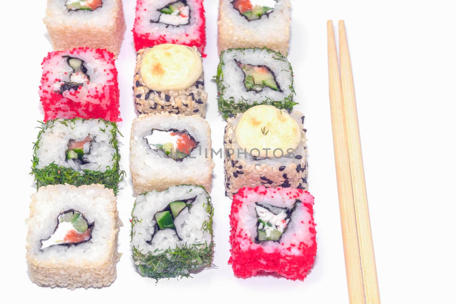 four pieces of sushi on a white background. the view from the top. High quality photo