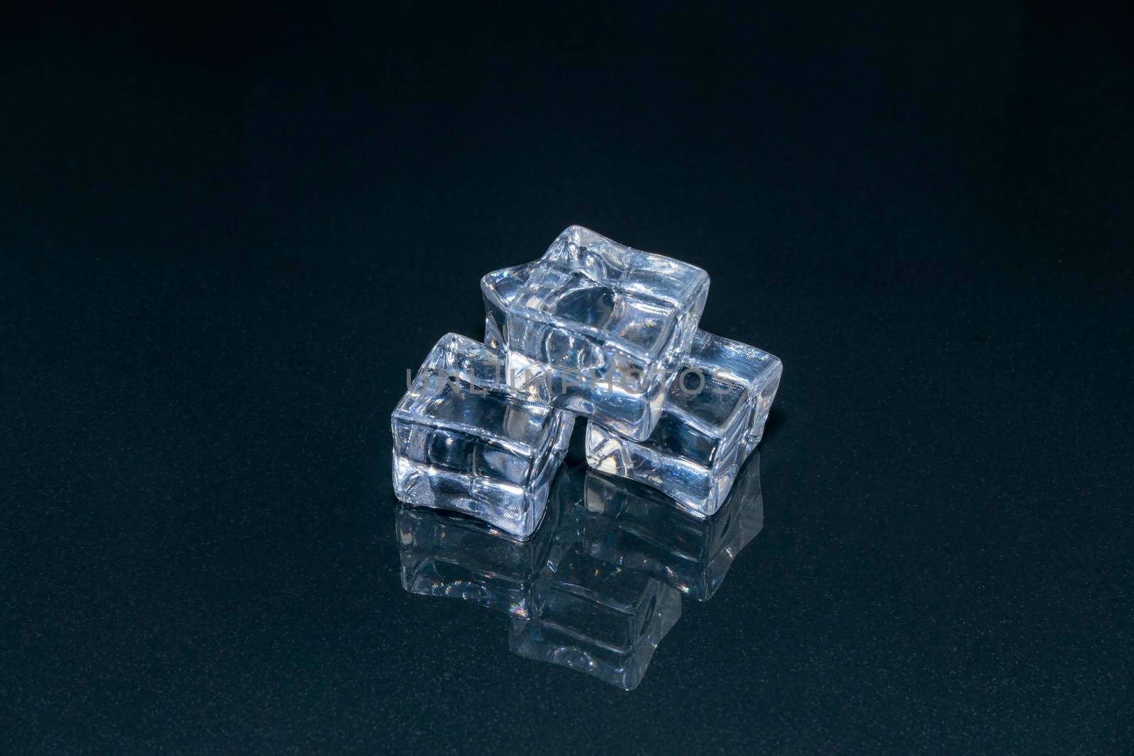 ice cubes on a black background close-up. High quality photo