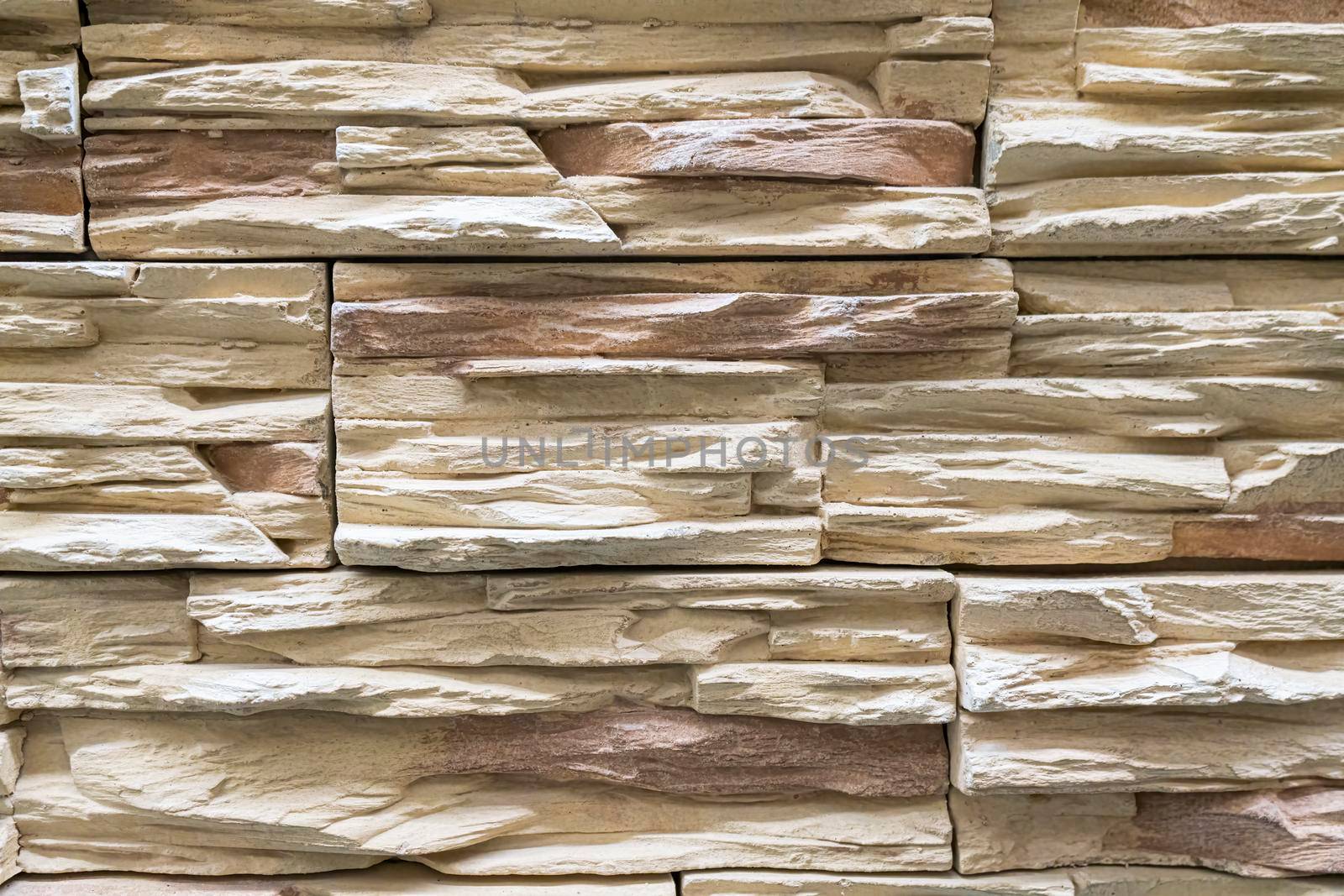 masonry wall paving stones as a background close up