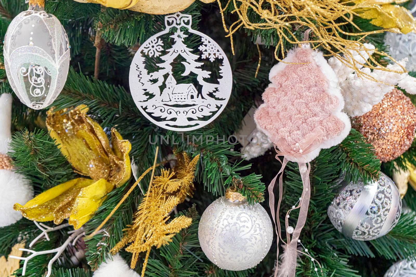 fir branches decorated with christmas toys close up. High quality photo
