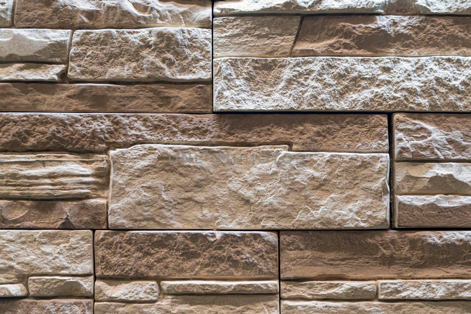 masonry wall paving stones as a background close up
