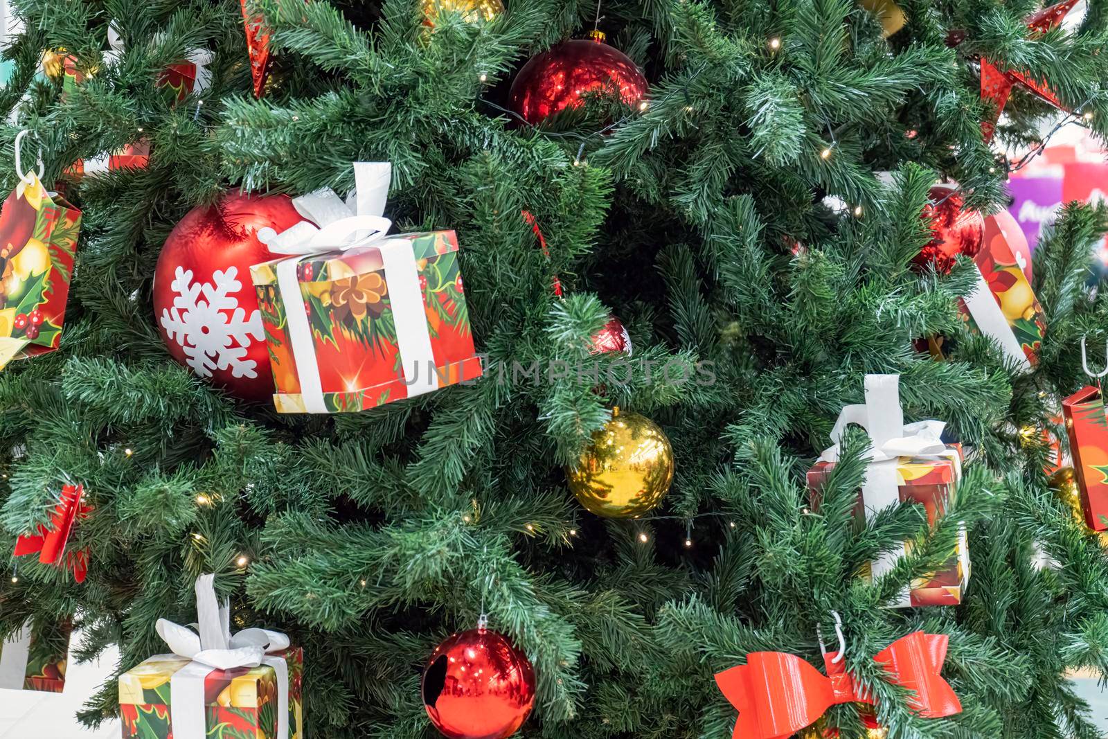 fir branches decorated with christmas toys close up. High quality photo