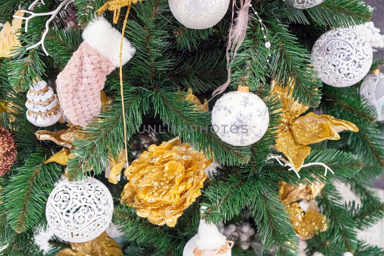 fir branches decorated with christmas toys close up. High quality photo