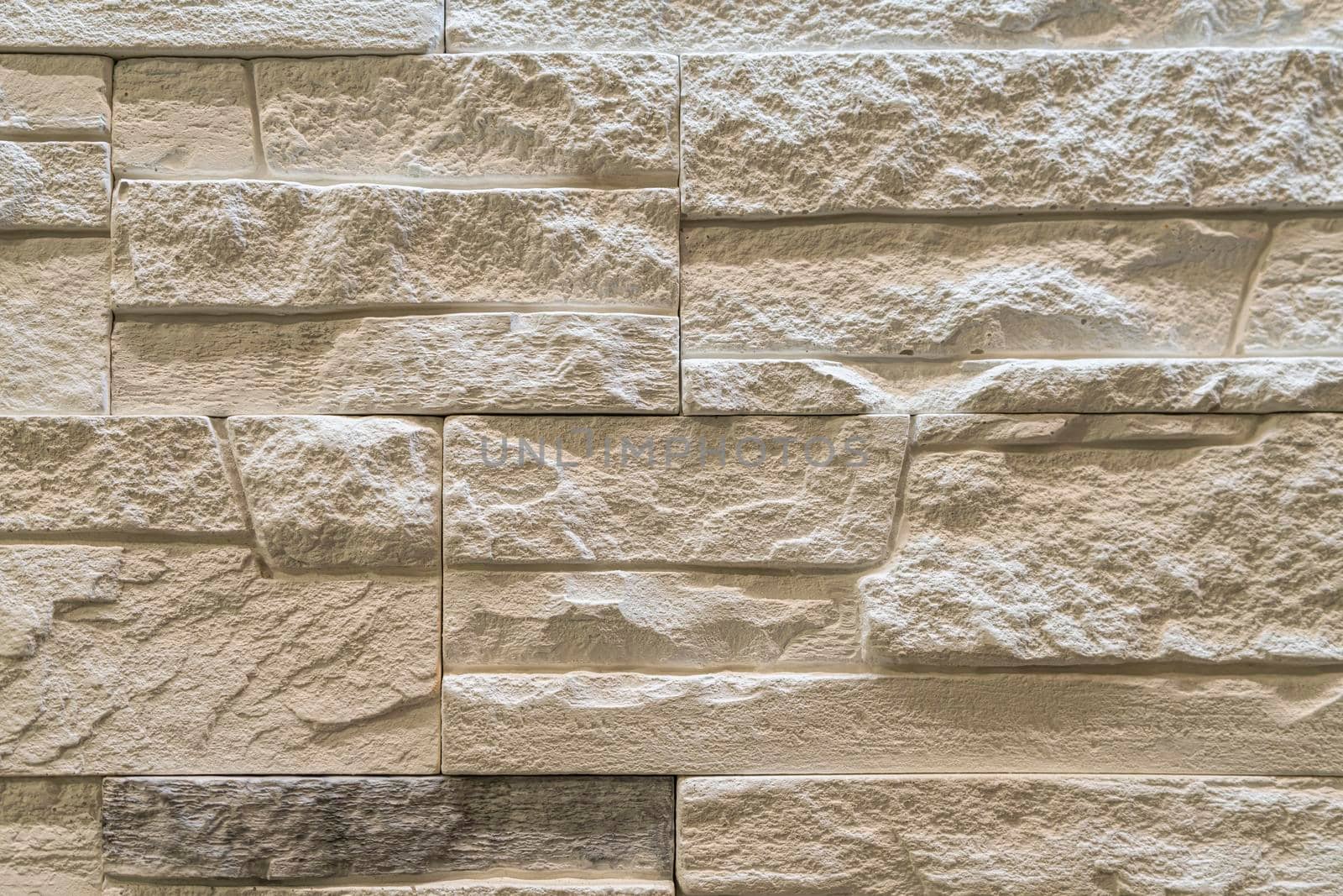 masonry wall paving stones as a background close up