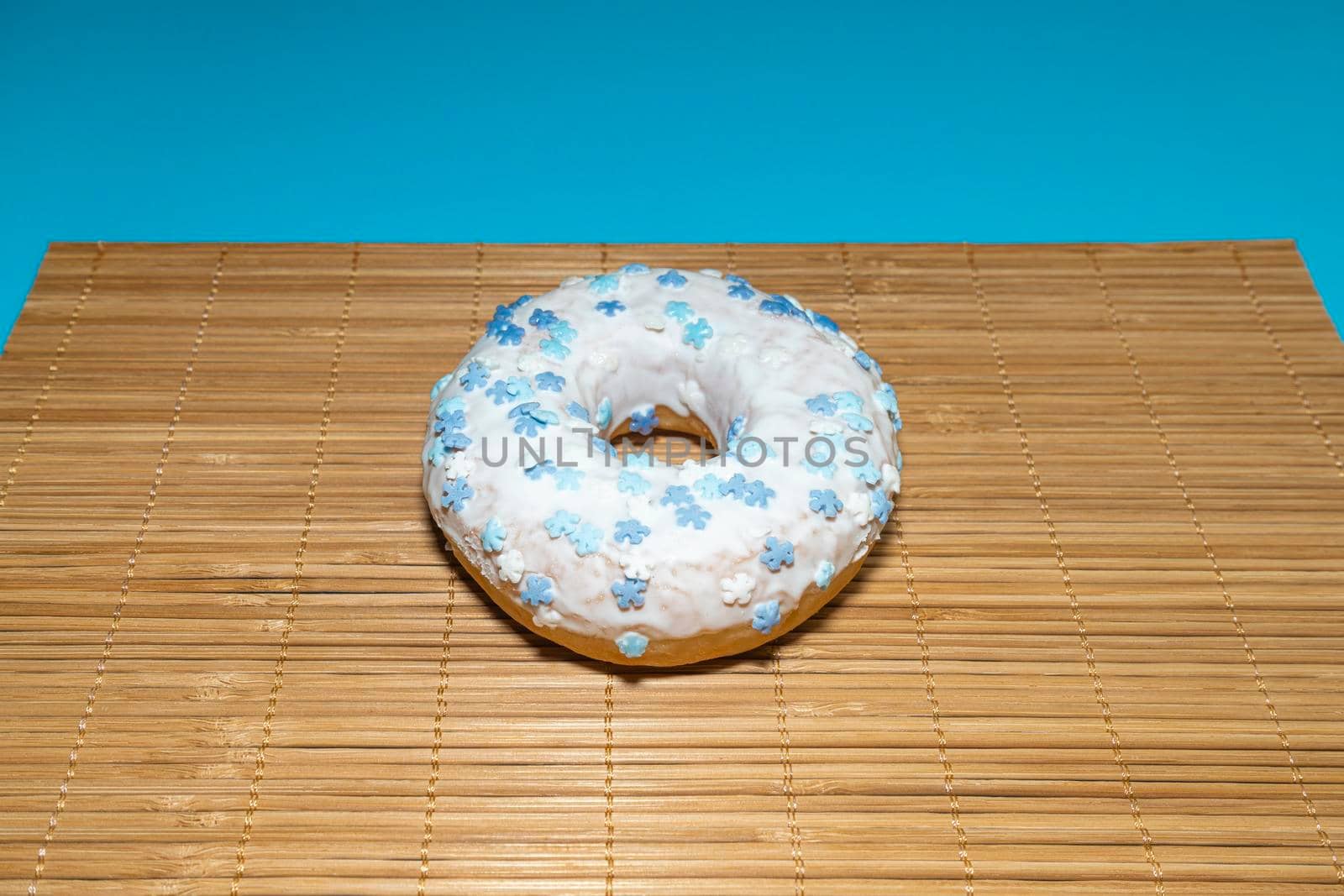 donut donuts on a bamboo background close-up. isolate. High quality photo