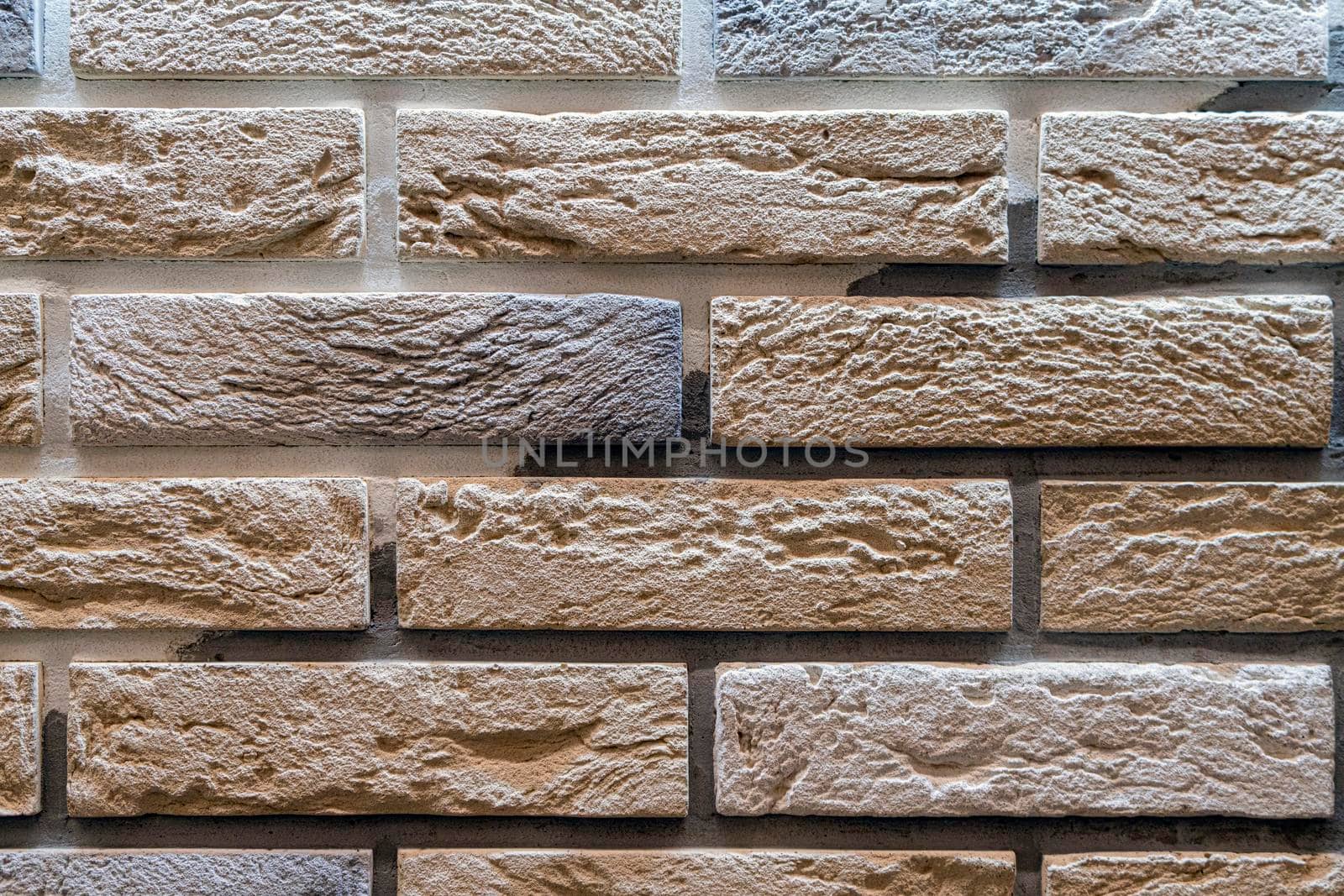 masonry wall paving stones as a background close up