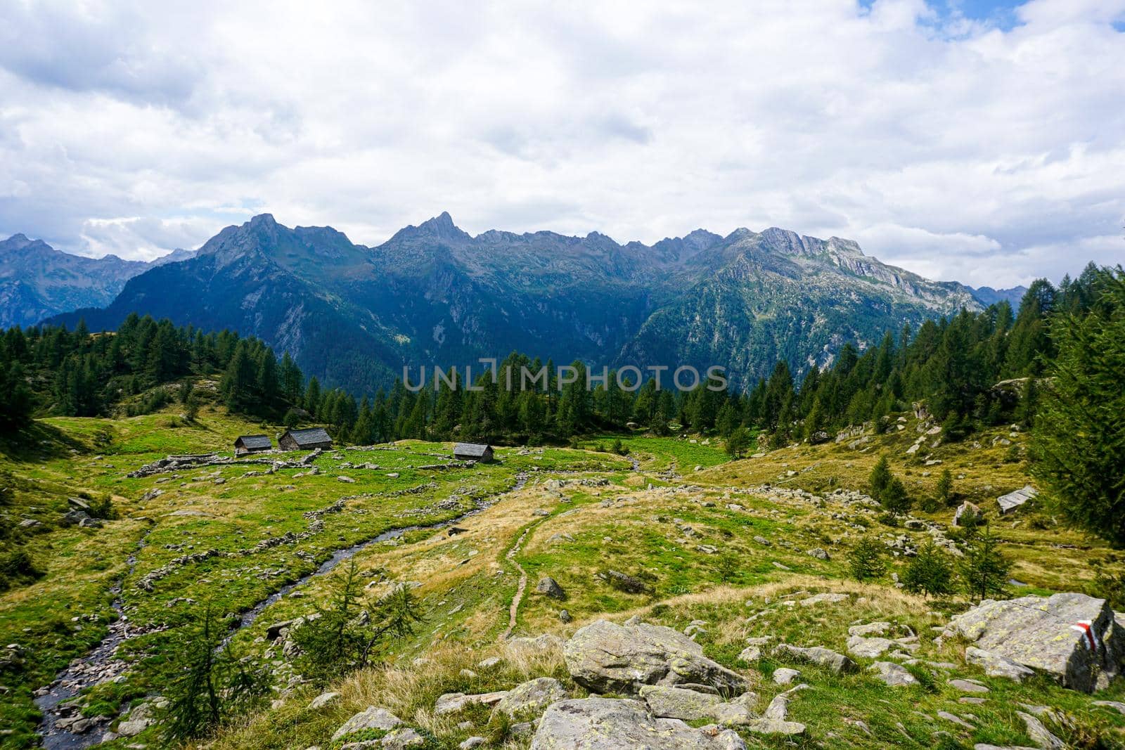 View over Corte di Mognola to the Pizzo di Röd mountain range, Switzerland by pisces2386