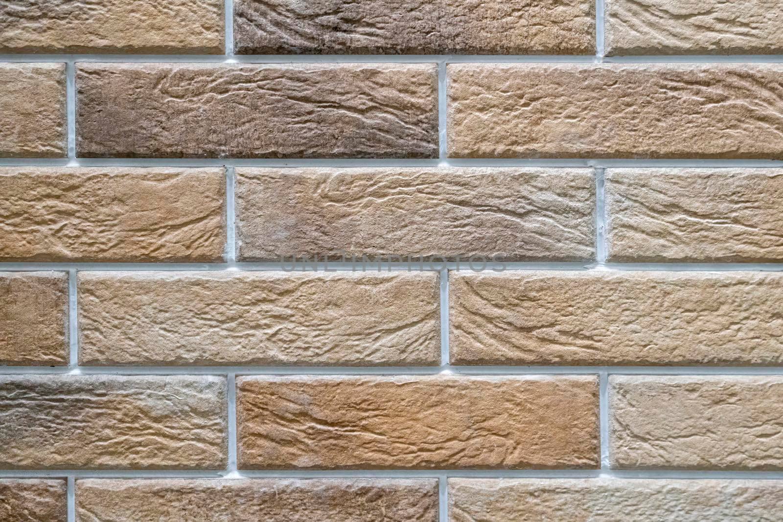 masonry wall paving stones as a background close up