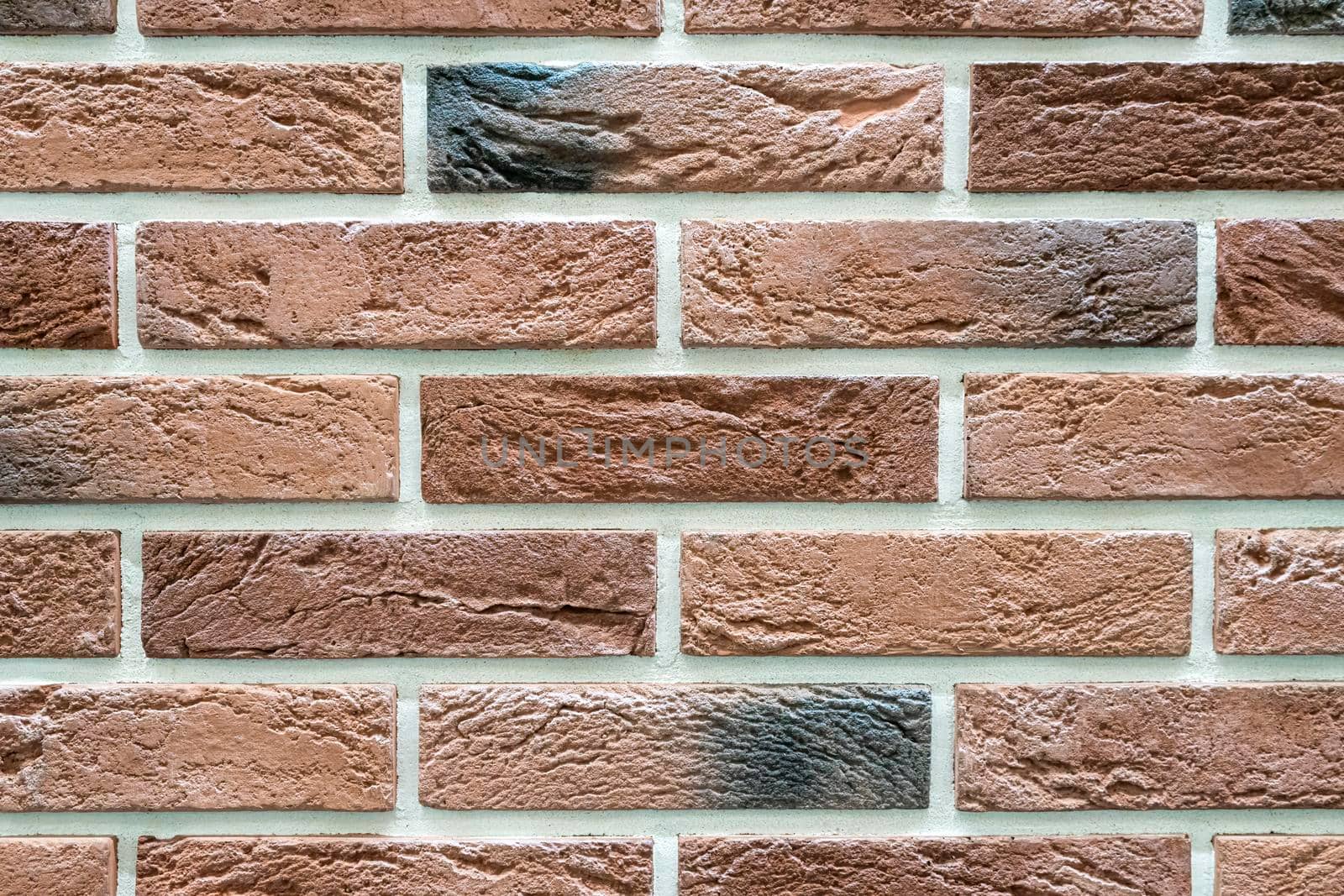 masonry wall paving stones as a background close up
