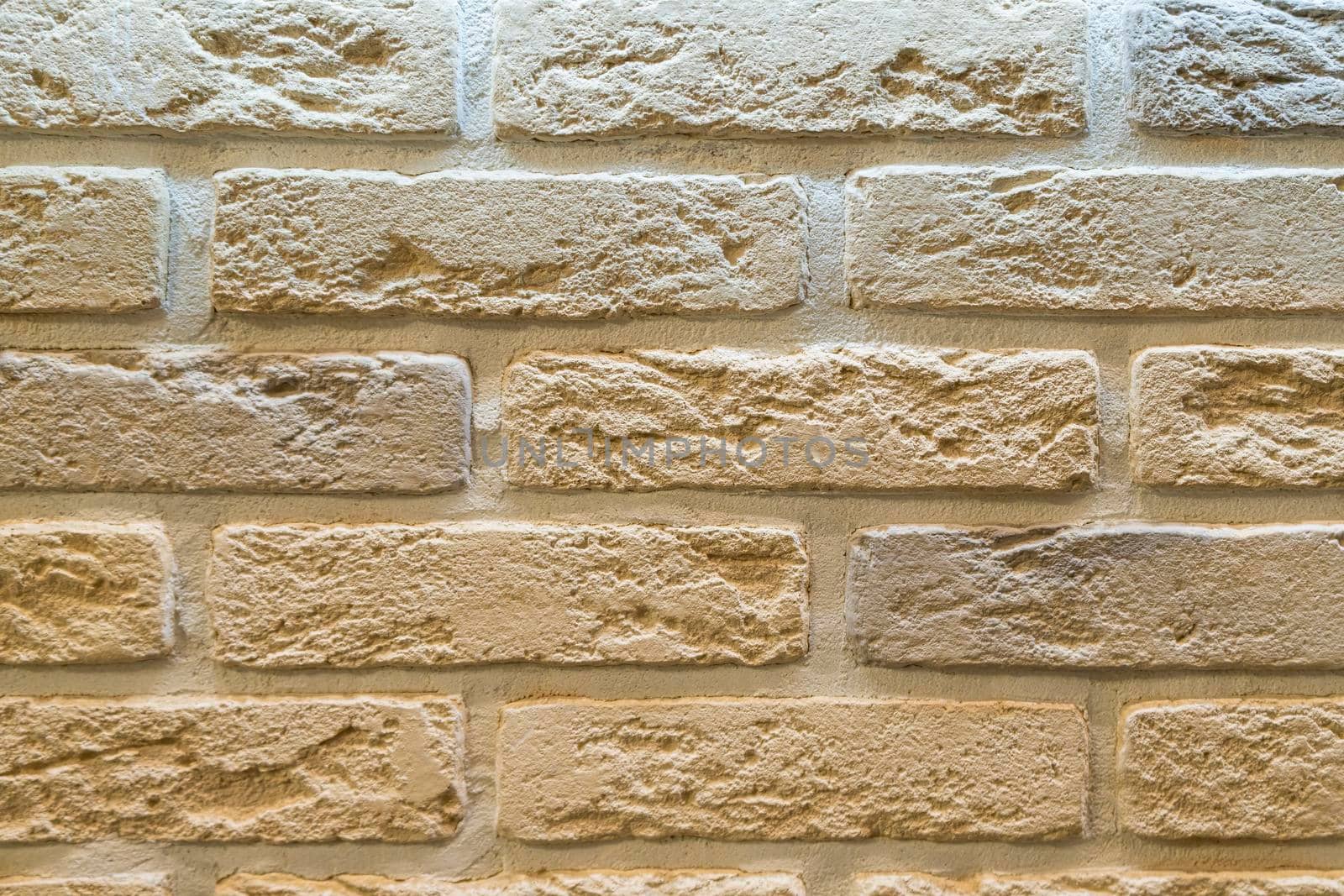 masonry wall paving stones as a background close up