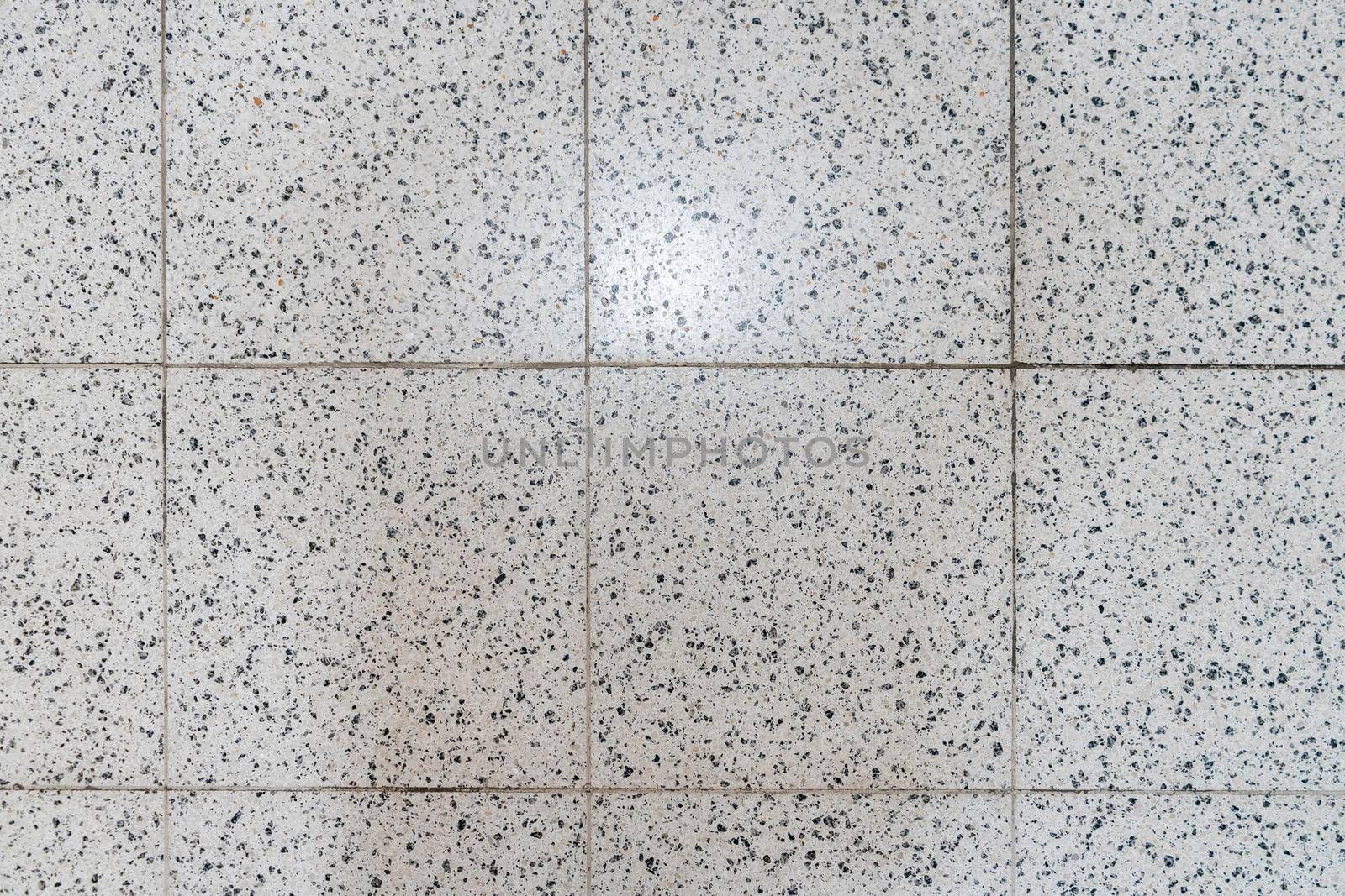 masonry wall paving stones as a background close up