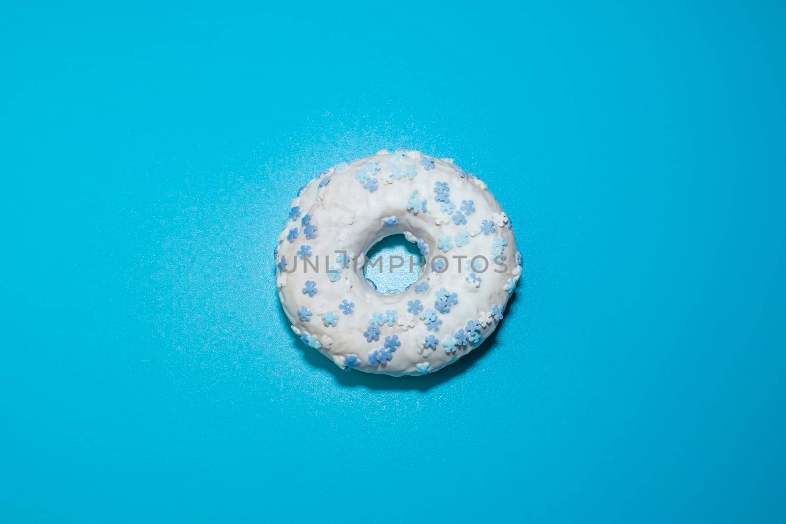 donut donuts on a blue background close-up. isolate. High quality photo