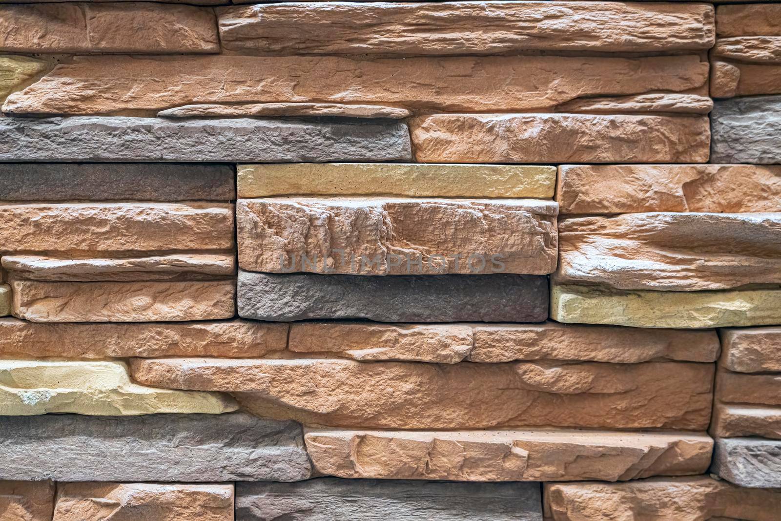 masonry wall paving stones as a background close up