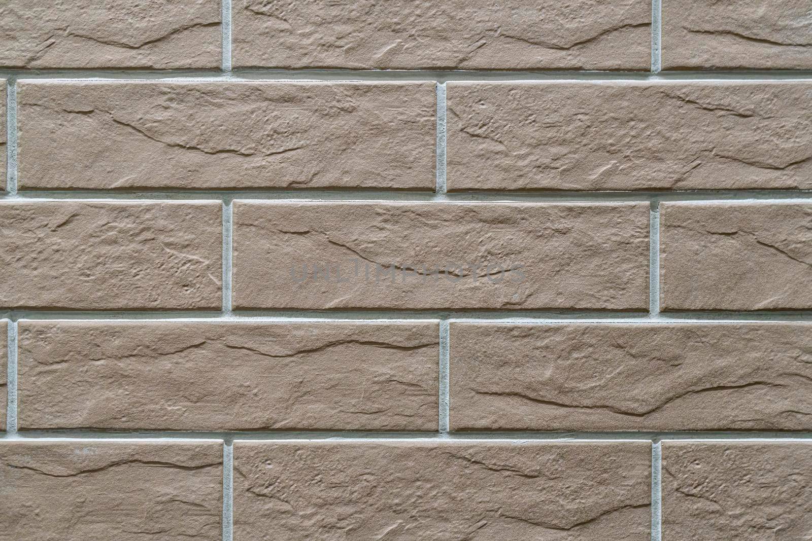 masonry wall paving stones as a background close up