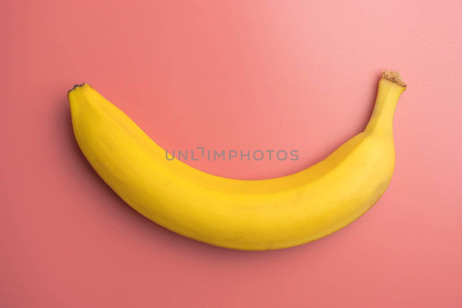 banana on a pink background. the view from the top. High quality photo
