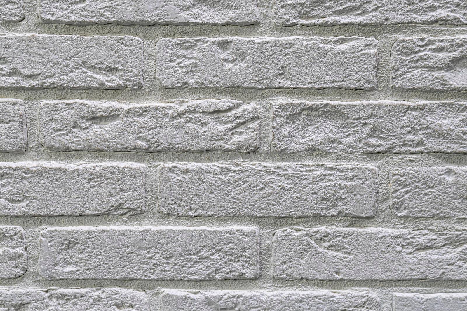 masonry wall paving stones as a background close up