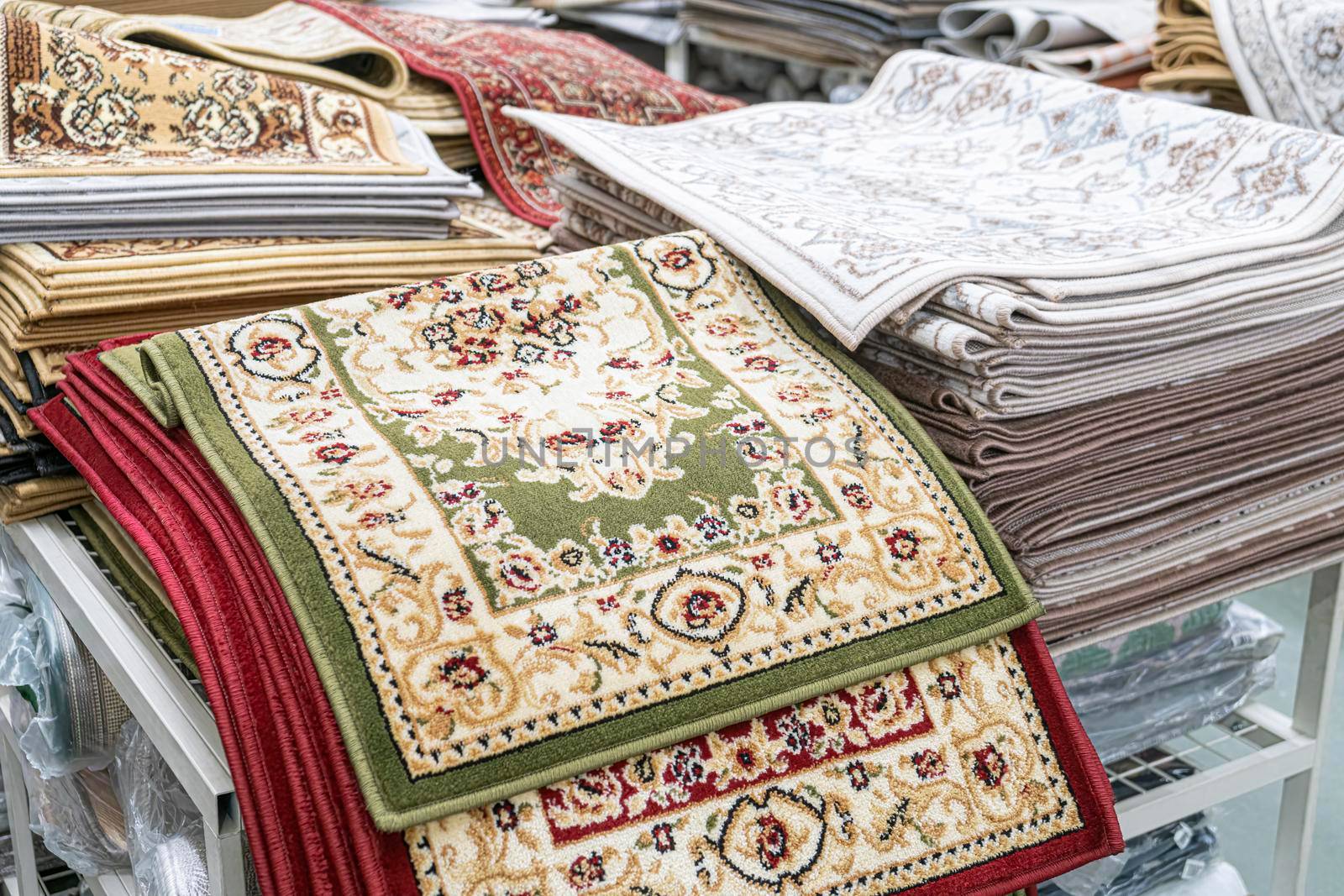 wool carpets on the shelves of stores. High quality photo