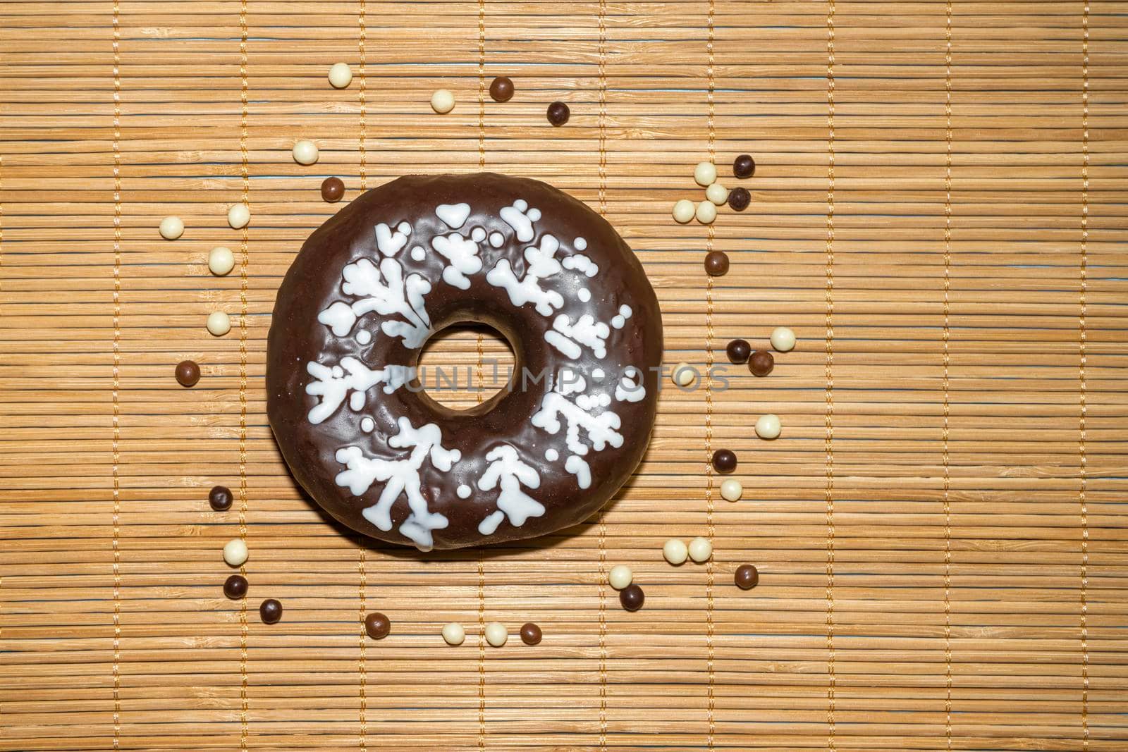 donut donuts on a bamboo background close-up. isolate. High quality photo