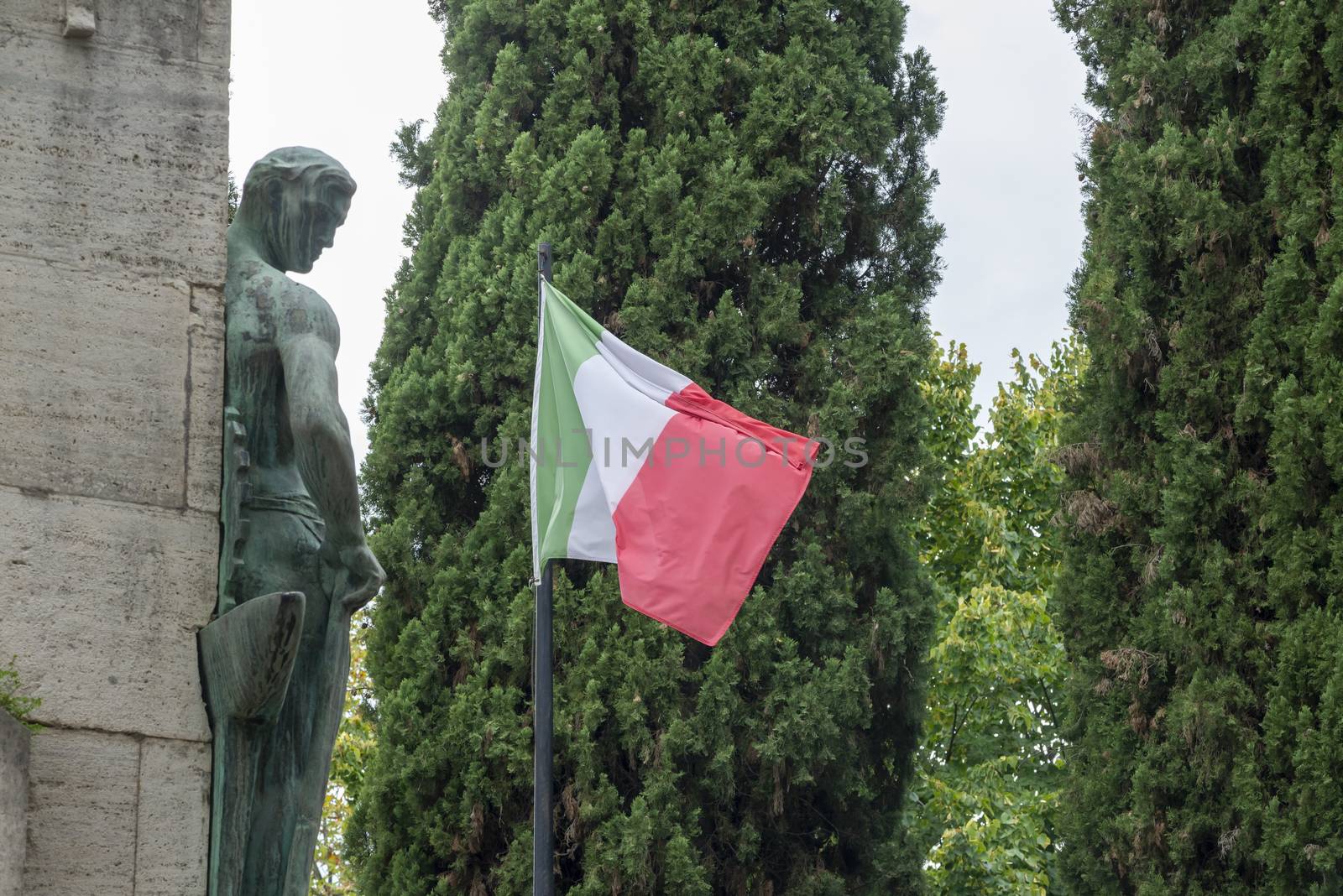 terni,italy august 16 2020:flag of italy in front of war memorial