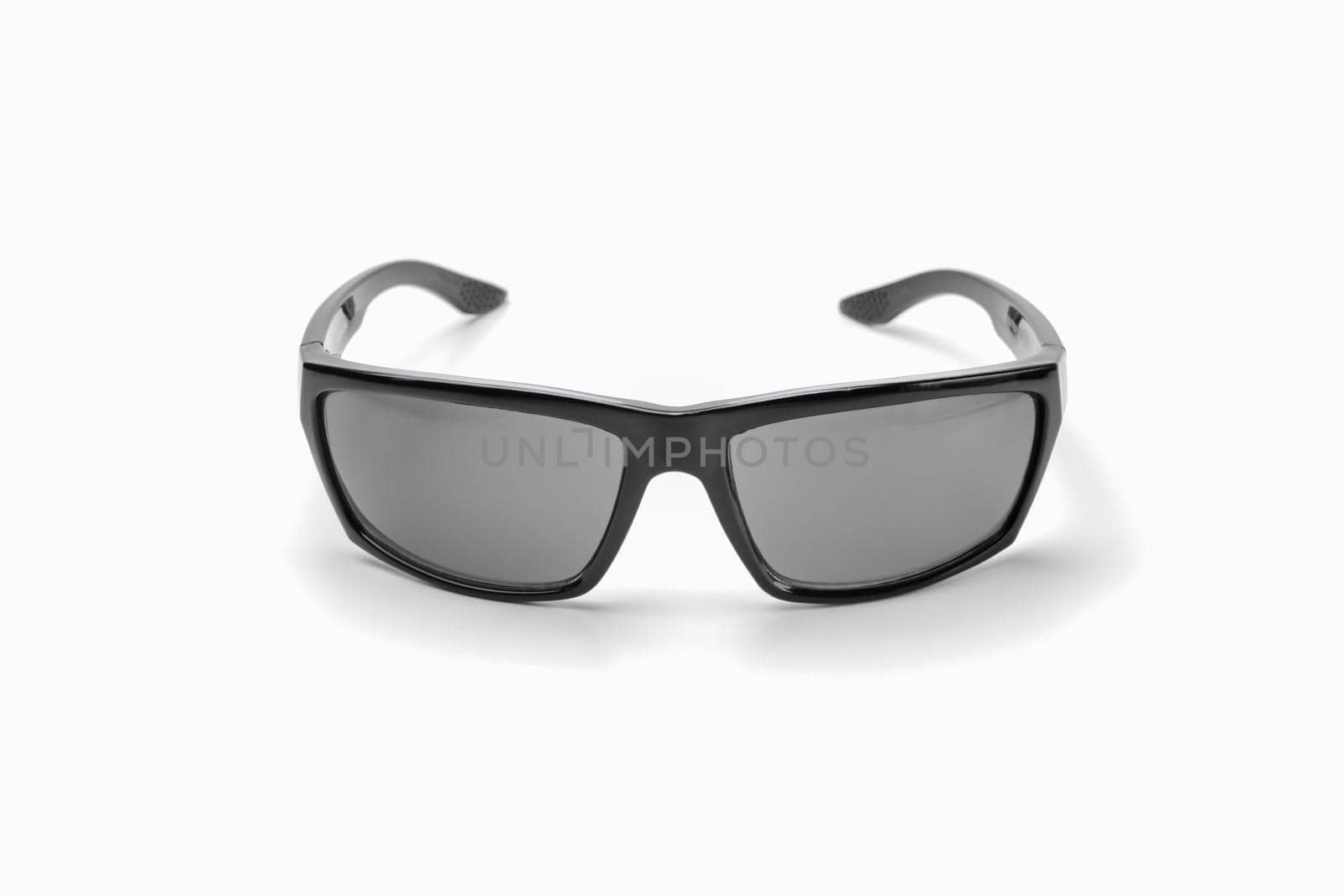 black sunglasses on a white background isolate by roman112007